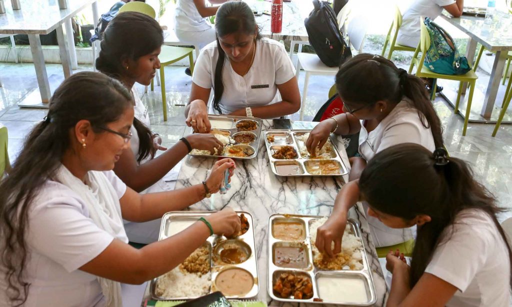 Indian Students having food in UV Gullas College of Medicine Hostel