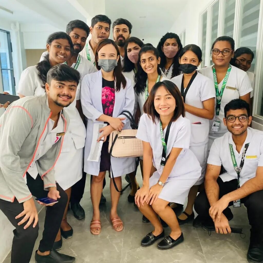Indian medical students in UV Gullas college of medicine along with their professor in classroom